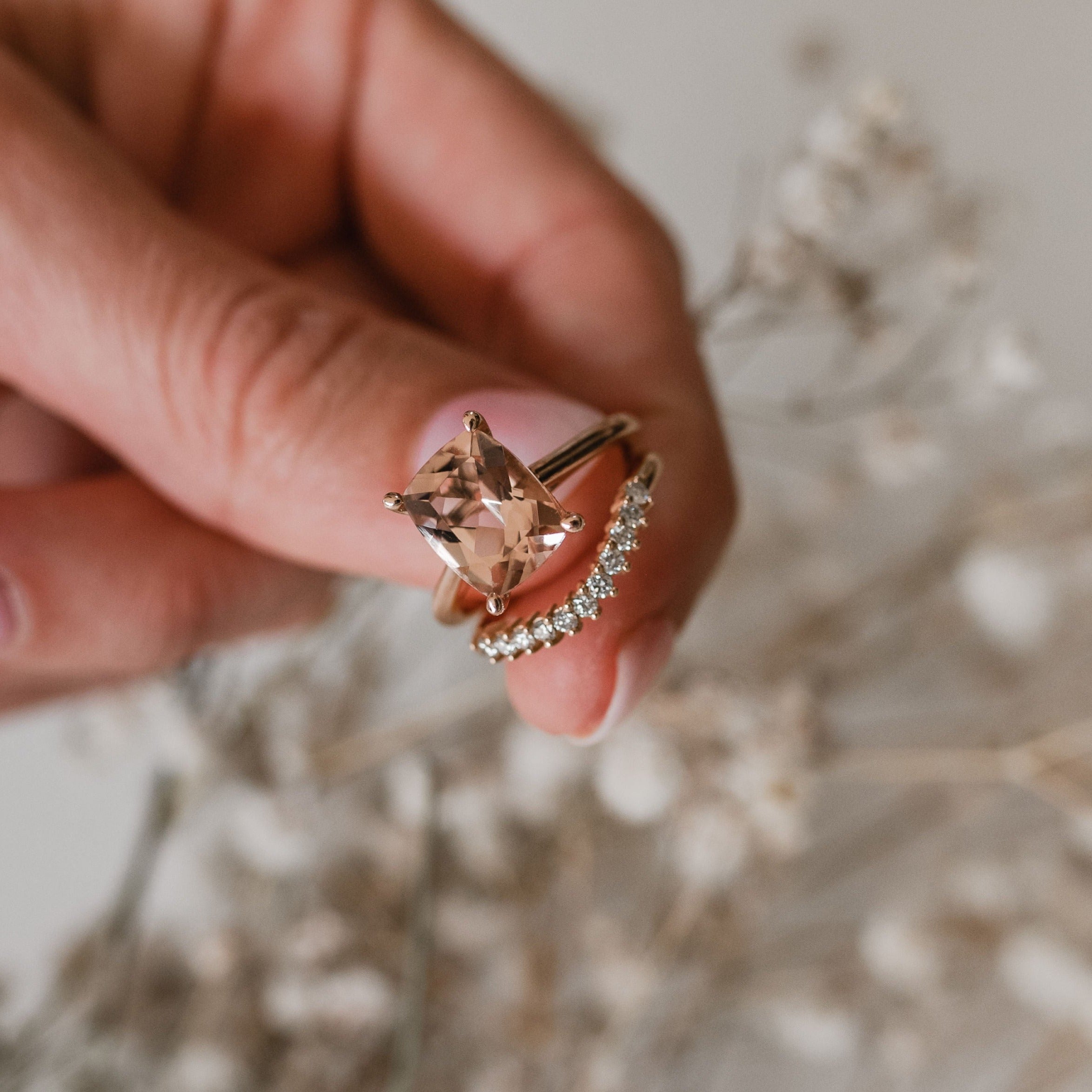 9ct rose gold cocktail ring with a 2.68ct peach morganite with curved diamond eternity band.
