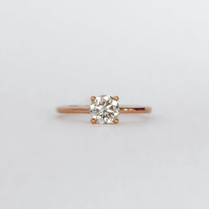 18ct rose gold solitaire ring with round brilliant cut centre stone.