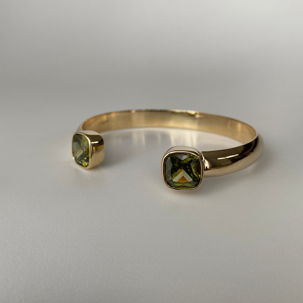 9ct yellow gold cuff with two bezel set citrines.