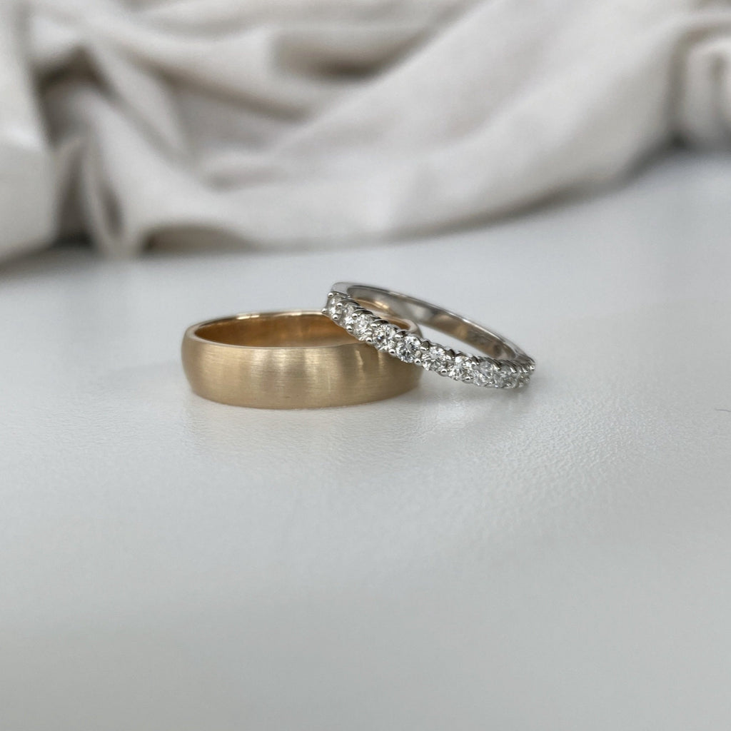 gents 18ct rose gold brushed wedding band and a 0.5ct diamond eternity ring in 18ct white gold.