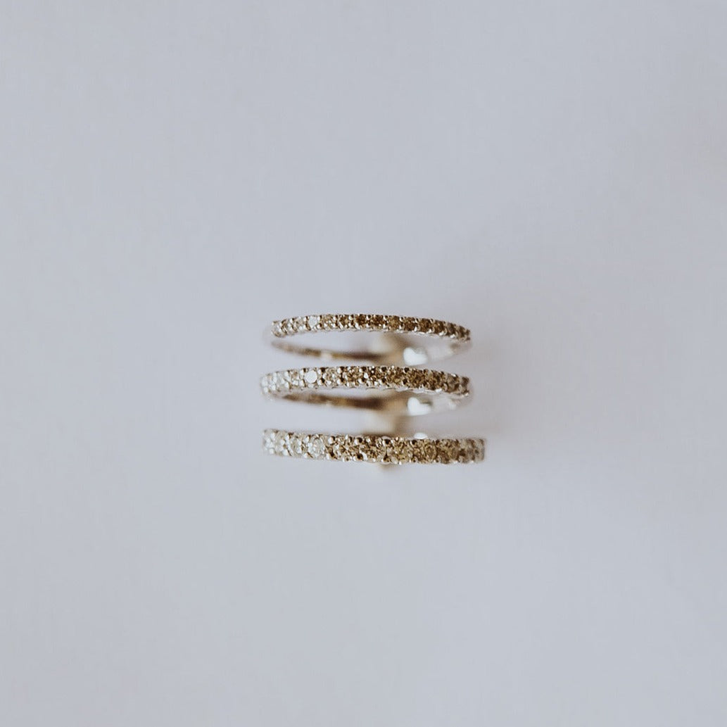 Three different sizes of diamond eternity bands.