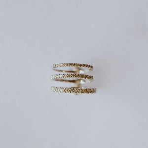 Different sized eternity bands.